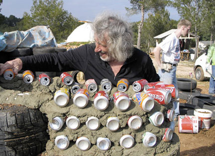 Architect Mike Reynolds works on a Can Wall - New Mexico - From the film Garbage Warrior by Oliver Hodge